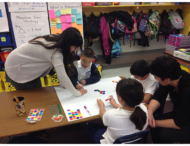 Tara Tanasovich, freshman, mathematics major, teaching the lesson, "Probability and Bar Graphs." 